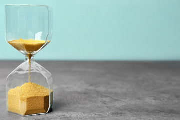 Hourglass on table. Time management concept