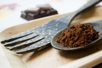 coffee grounds on a wooden spoon