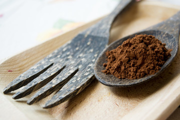 coffee grounds on a wooden spoon