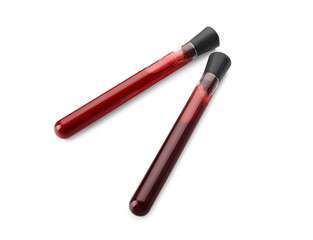 Test tubes with blood samples on white background