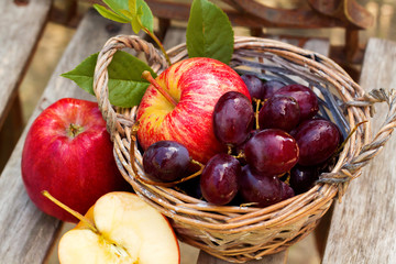 juicy fresh fruit in the basket are on the table