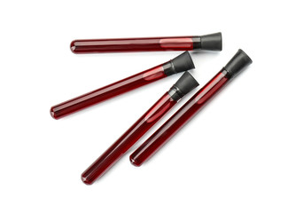 Test tubes with blood samples on white background