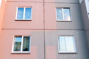 Three windows on the wall, the texture of the window background.