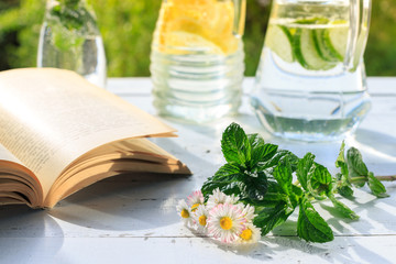 Relax time with book and fresh homemade lemonade.
