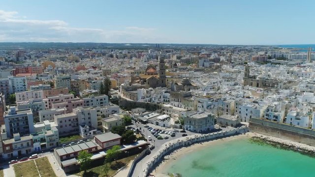 White city Monopoly and blue sea coastline in Italy Drone flight 4k