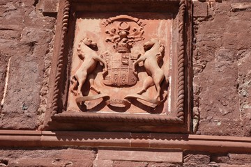 Stone carving depicting coat of ams