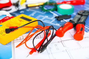 Different electrical tools on house plans, closeup