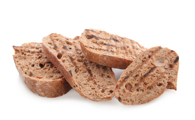Tasty toasted bread on white background