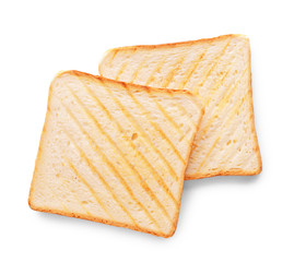Tasty toasted bread on white background, top view