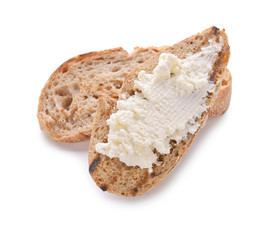 Toasted bread with cream cheese on white background