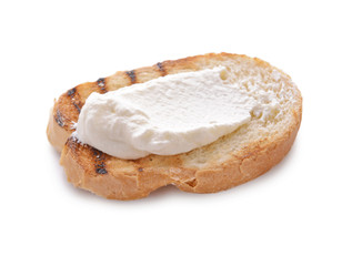 Toasted bread with cream cheese on white background