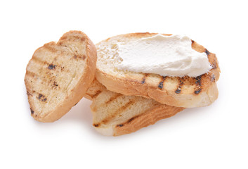 Toasted bread with cream cheese on white background