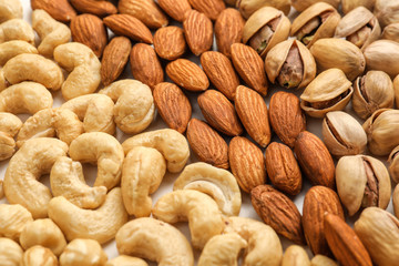 Different tasty nuts, closeup
