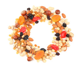 Different nuts, dried fruits and berries on white background, top view