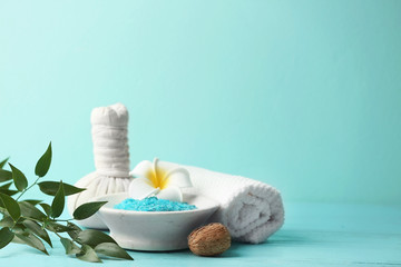 Beautiful spa composition on table against color background