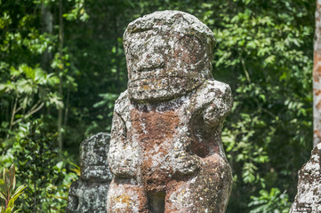 historic stone statues, so called Tikis, created by native inhabitants of Hiva Oa, Marquesas Islands, French Polynesia