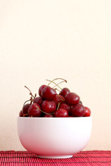 bowl full of red ripe cherries