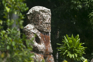historic stone statues, so called Tikis, created by native inhabitants of Hiva Oa,  Marquesas Islands, French Polynesia