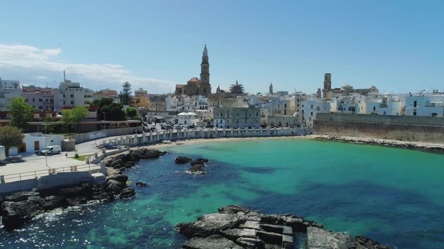 White city Monopoly and blue sea coastline in Italy Drone flight 4k