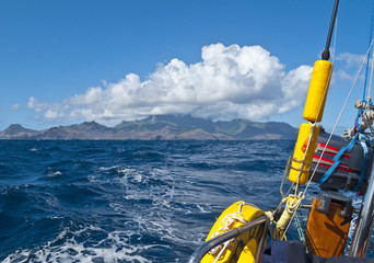 approaching Ua Pou Island from sea, Marquesas Archipelago, French Polynesia, spectacular landscape with extremely steep mountains