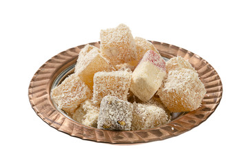 Traditional Turkish delight in vintage plate isolated on white background.      
