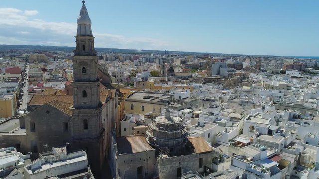 Old Church in Monopoly and blue sea coastline in Italy Drone flight 4k