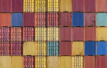 stacked containers on the dockside