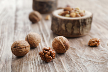 Tasty walnuts on wooden table