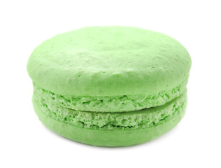 Green tasty macaron on white background