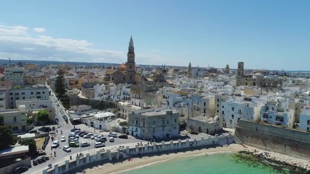 White city Monopoly and blue sea coastline in Italy Drone flight 4k