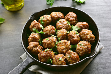 Meatballs in frying pan