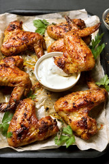 Grilled chicken wings with sauce