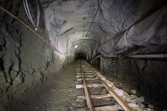 Underground old ore gold mine tunnel shaft passage mining technology with rails