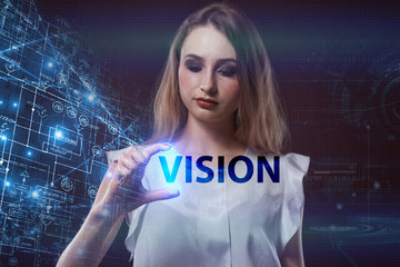 The concept of business, technology, the Internet and the network. A young entrepreneur working on a virtual screen of the future and sees the inscription: Vision