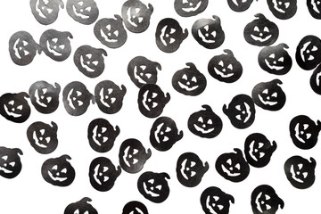 Halloween paper confetti decoration isolated on white background.