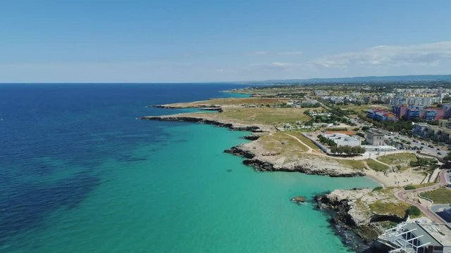 White city Monopoly and blue sea coastline in Italy Drone flight 4k