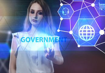 The concept of business, technology, the Internet and the network. A young entrepreneur working on a virtual screen of the future and sees the inscription: Government