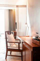 Contemporary Colonial living room with wooden chair and  table