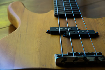 Wooden Electric Bass Guitar Closeup