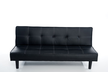 cozy empty black couch on white