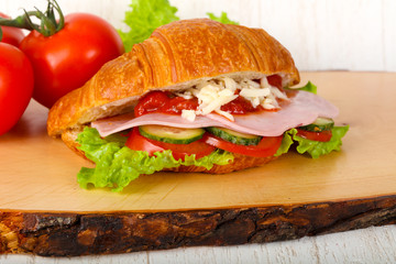 Croissat with ham and cheese