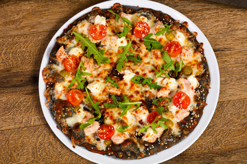 Pizza with salmon and mozzarella