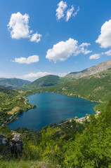 Naklejka na ściany i meble Lake Scanno (L'Aquila, Italy) - When nature is romantic: the heart - shaped lake on the Apennines mountains, in Abruzzo region, central Italy