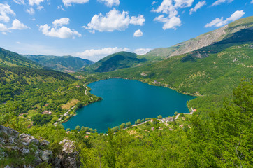 Naklejka na ściany i meble Lake Scanno (L'Aquila, Italy) - When nature is romantic: the heart - shaped lake on the Apennines mountains, in Abruzzo region, central Italy