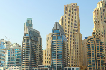 Fototapeta na wymiar United Arab Emirates. Dubai Marina. Beautiful high skyscrapers. Close-up. City landscape. Background. Spring, March, 2018.