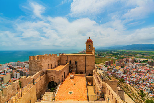 View of the castle in the city of Cullera on a cloudy day. District of Valencia. Spain