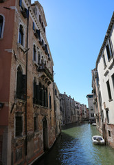 Fototapeta na wymiar canal among the houses in Venice in Italy