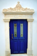 Obraz premium Marble decoration on a house's entrance at Pyrgos village, Tinos island, Cyclades, Greece.