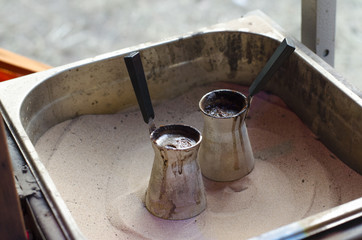 Making coffee in jesze on the sand