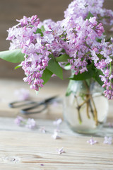 Bouquet of pink lilac in pitcher